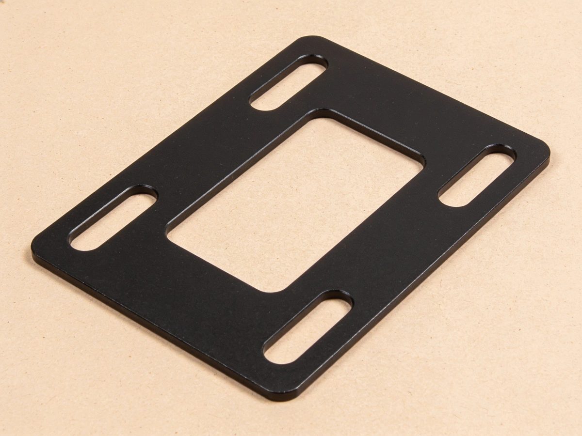 Flat Base Adapter Plate — 5 mm black powder-coated steel; central relief cut-out